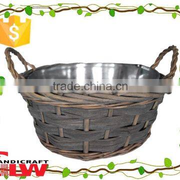 wicker and woodchip garden furniture, plant pot, garden flower basket with round iron bowl inside