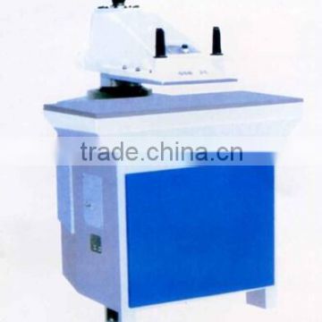 Hydraulic swing arm press cutting machine