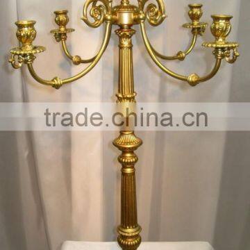 Gold candelabra with flower bowl