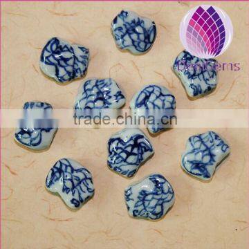 2015 whole sale artificial for DIY jewelry making Bead porcelain white and blue 13X15mm dragon shape 50pcs per bag