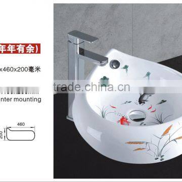 3044 Teardrop-shaped art basin with spillway hole ring and painted fishs