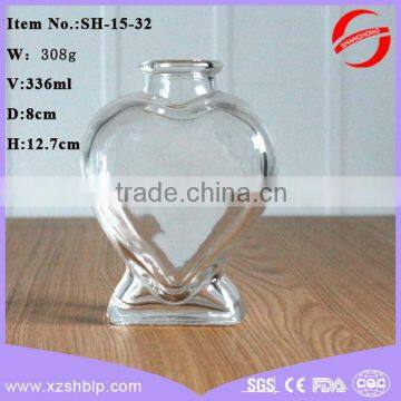 Heart-shaped artware glass craft glass bottle with cork wholesale