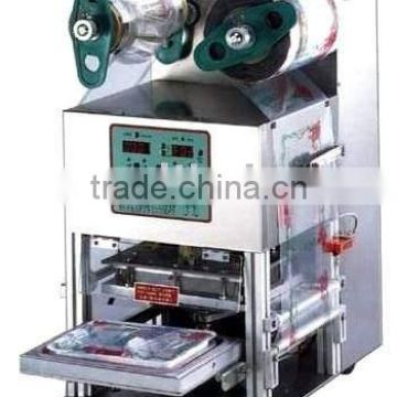 Automatic tray sealer