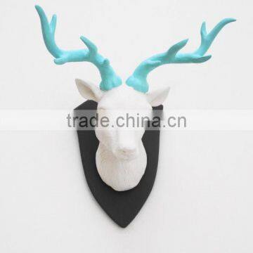 blue and white derorative deer head wall decor