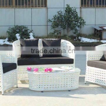 white wicker table and chair