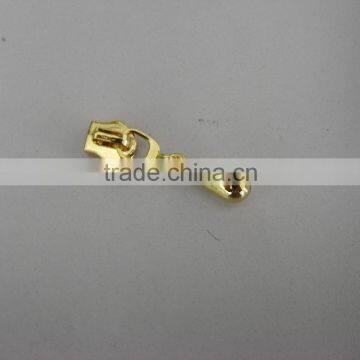 Garment golden metal zipper slider with puller