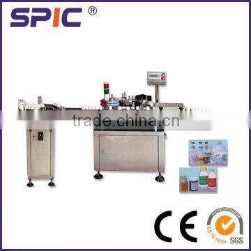 Automatic sticker labeling machine for plastic bottles