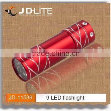 Colorful promotion 9 led flashlight torch with Surface carving craft, exquisite design