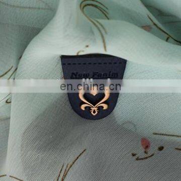 Leather patch with metal decoration for leather bag