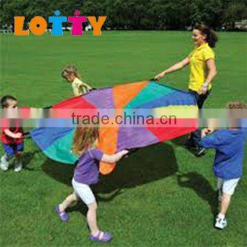 Children outdoor kids play parachute