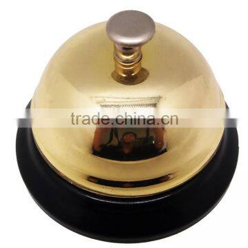 Dinner bell in gold cover with colorful painted base