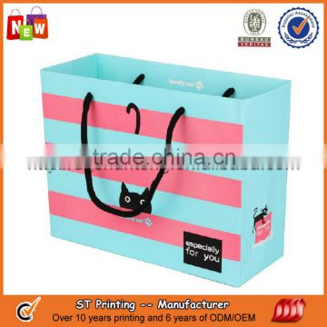 Blue paper gift bag with pp rope