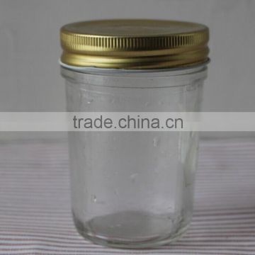 Round glass jam jar with mental lid