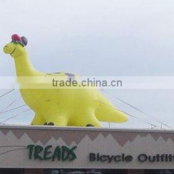 advertisement inflatable dinosaur