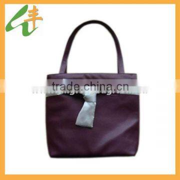 small handbag material with beautiful bow