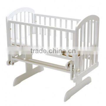 Wooden baby glider crib in white