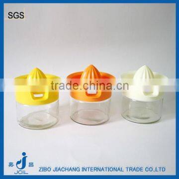 decorative round glass lemon squeezer with cap