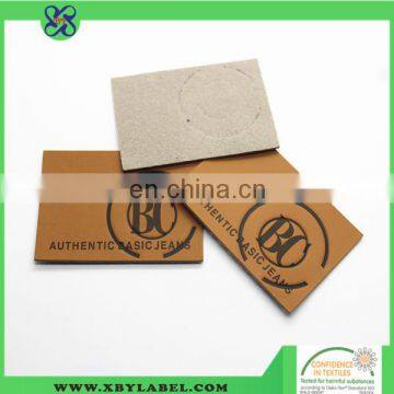 Custom pu leather metal labels embossed label