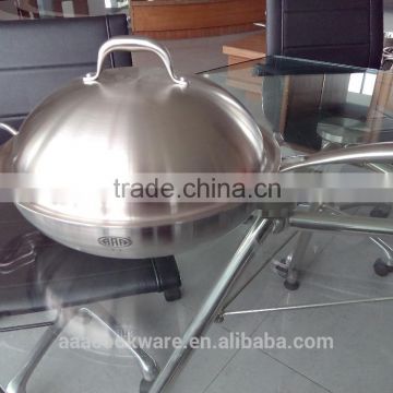 Stainless steel wok and steamer