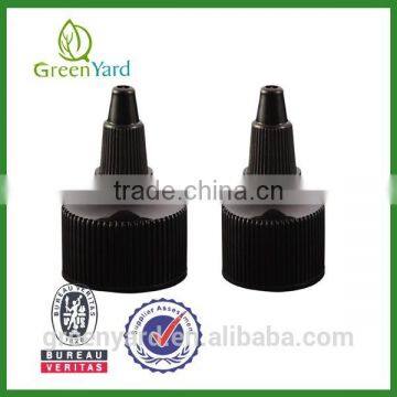 Ribbed twist open/close nozzle cap