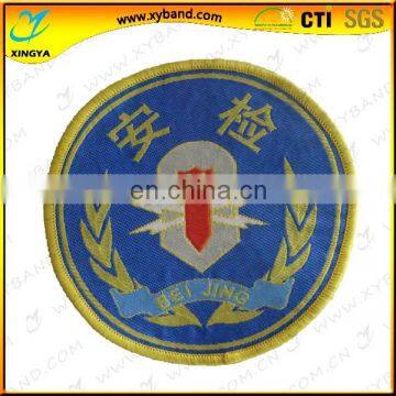 rond woven Scouts badges