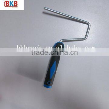 Paint roller frame in brush with plastic handle