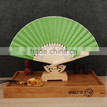 Factory Direct Bamboo Hand Fan Wedding Gift Cloth Folding Hand Fan in Plain Color photo-5