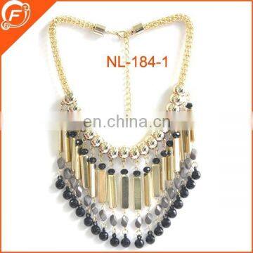 women dressing metal chain necklace with tubes