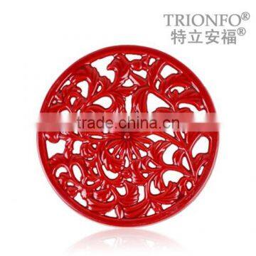 round color enameled cast iron Trivet