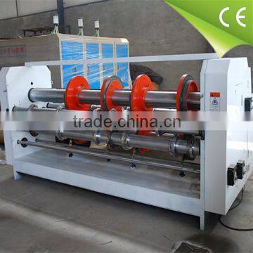 Rotary slotter scorer corner cutting box machine