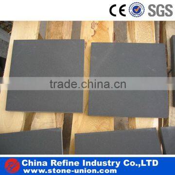 Honed black sandstone