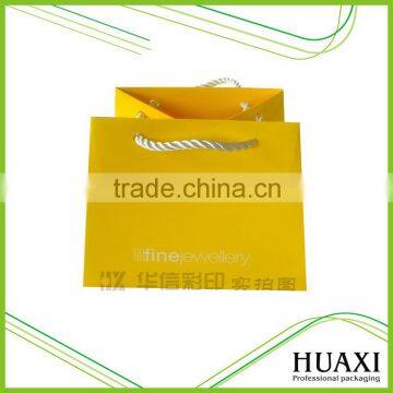 Top Sale yellow glossy laminated paper gift packaging bags