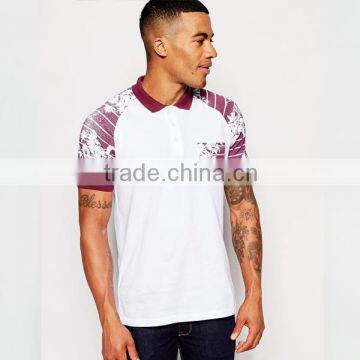 polo shirt with pocket and burgundy floral print sleeve