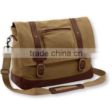 Tan leather canvas messenger bag