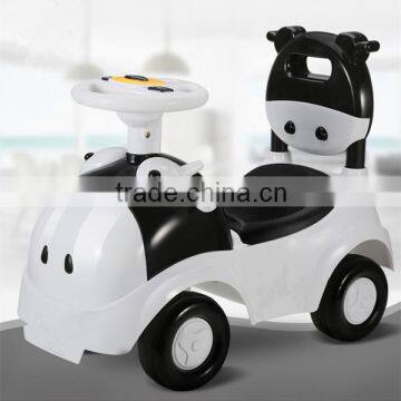 Hot sales CE approved children swing car,4 wheels cartoon cow children tricycle bicycle toys baby swing car with music