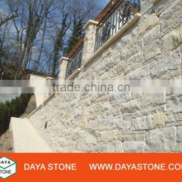 Exterior wall cladding stone