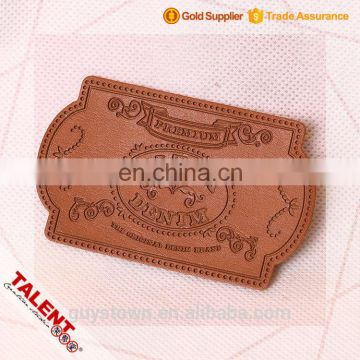 Custom thin cow skin hot stamping embossed pattern die cut shape leather label