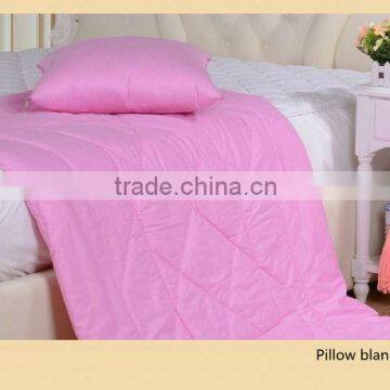 Solid color polyester folding blanket into cushion