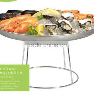 Stainless steel seafood serving platter; Stainless steel charger tray