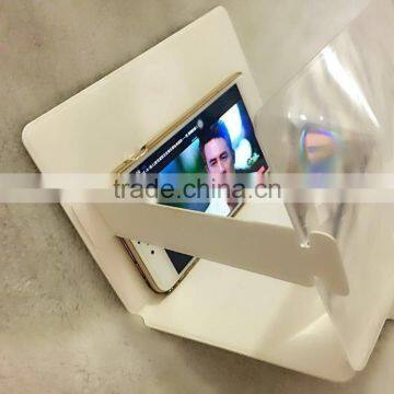 Foldable mobile phone magnifier