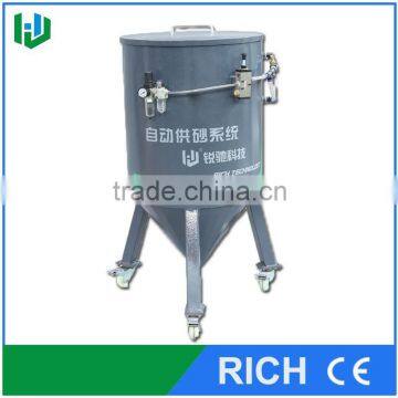 Auto abrasive delivery system for water jet cutting machine