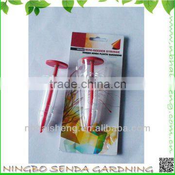 plastic garden handle plant seeder