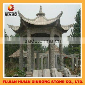modern stone garden kiosk with furniture