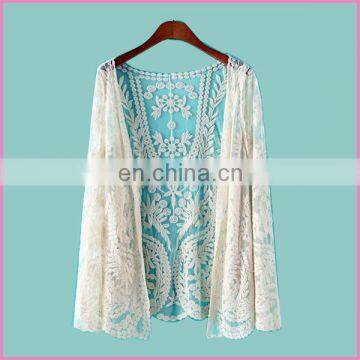 pocho design gauze with embroidered flower hollow blouse