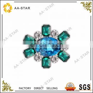 Light blue acrylic sew-on gemstones with green