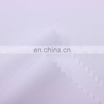 100% Polyester 75D*150D Plain Microfiber Peach Skin Fabric for Beach Shorts photo-4