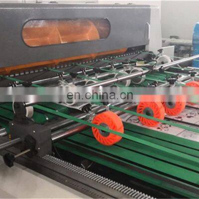 UCM1900A High Speed 4 Roll Automatic Paper Cutting Slitting Machine With Conveyor Belt Stacker photo-2