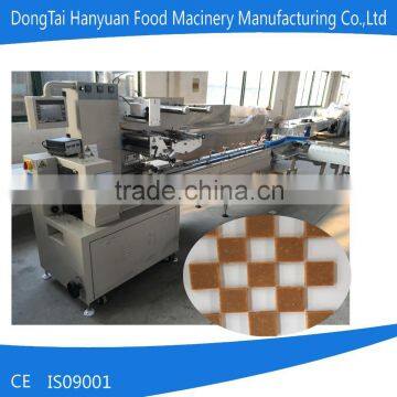 Automatic packing machine for cereal bar, rice candy,peanut candy