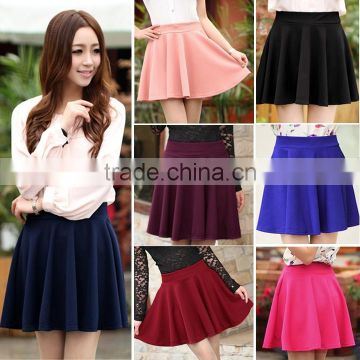 Woman candy color pleated mini skirt simple design