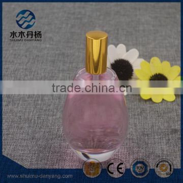 Fancy 100ml clear refillable glass perfume bottle with golden cap